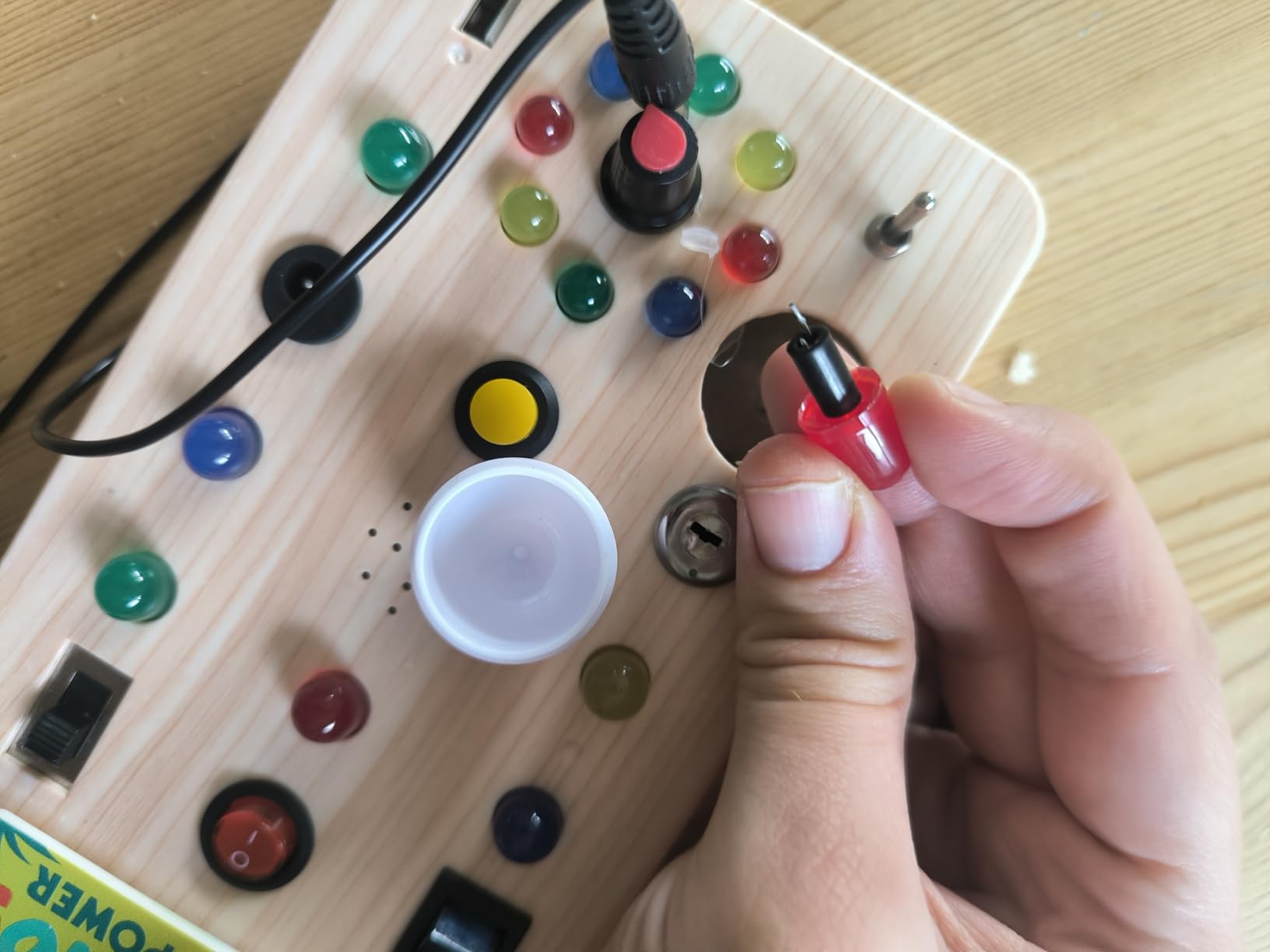 WEARXI Busy Board Holzoptik LED Dinosaurier Sound